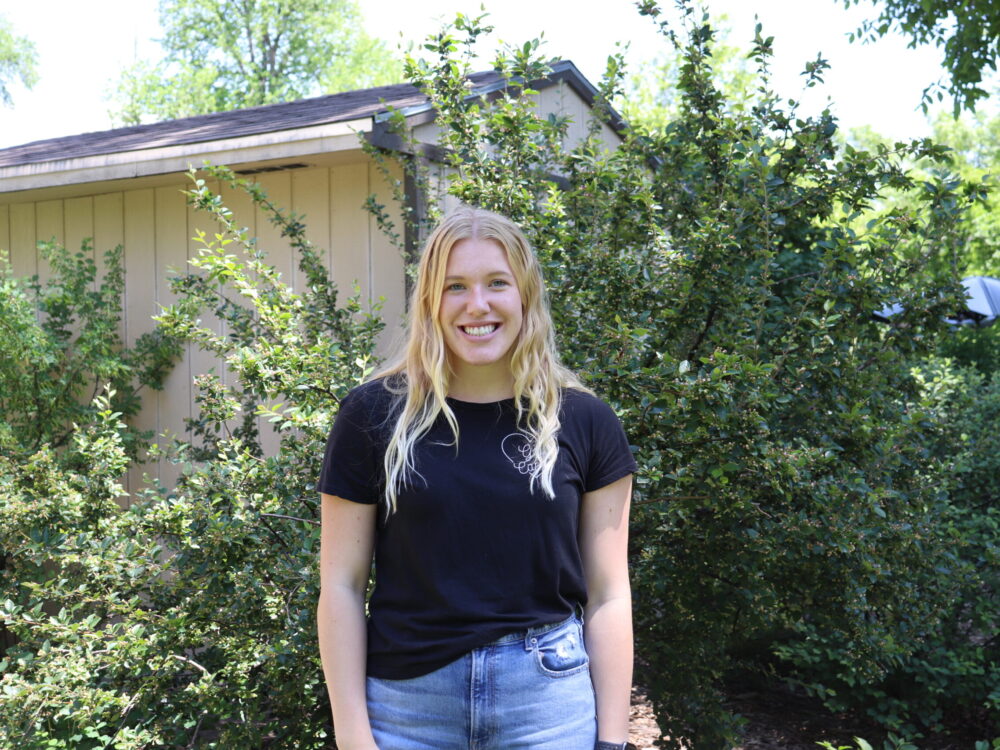 An outdoor portrait of Ellie Hahn